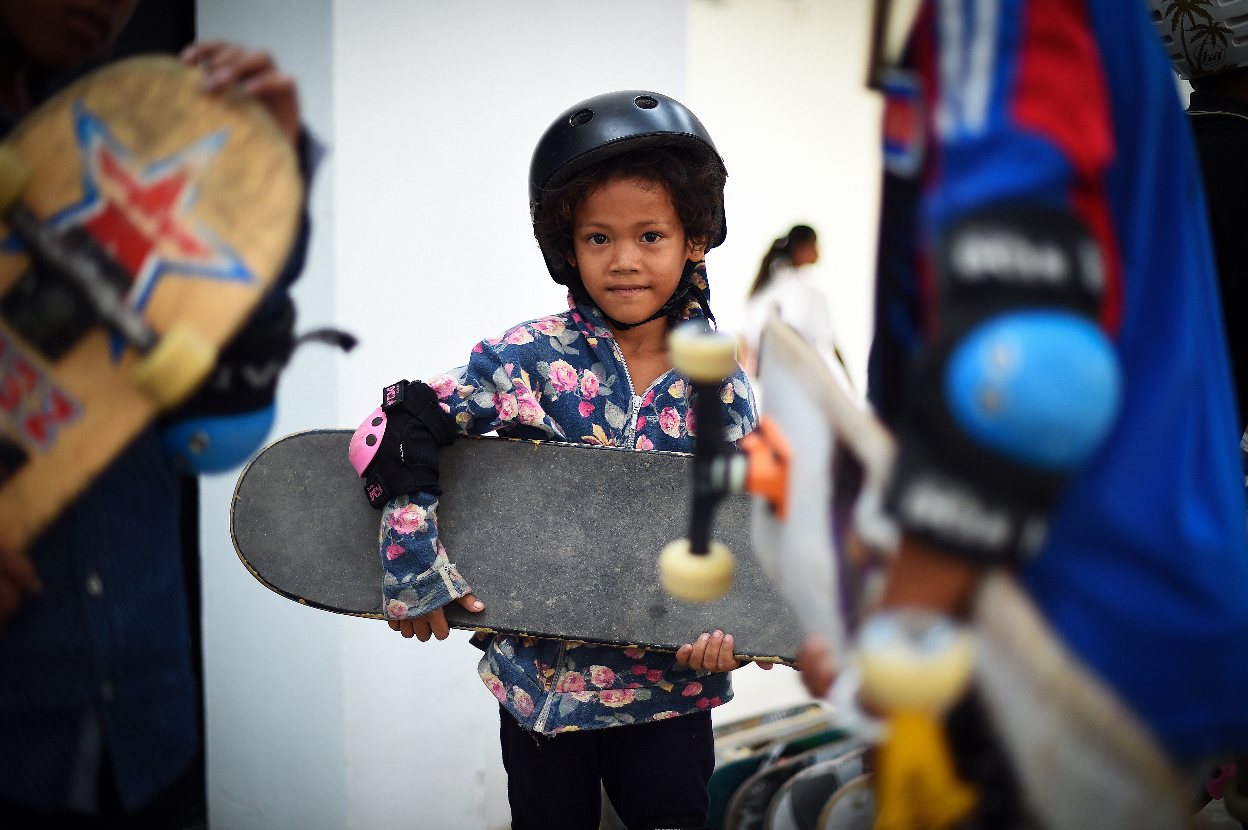 Girl with board in Phnom Penh